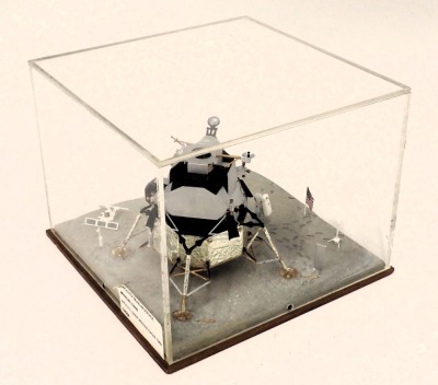 A model of the Apollo Lunar Module Eagle, in perspex and wooden case, 27cm wide. - 2