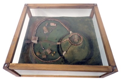 A diorama model of Tickhill Castle, showing the wooden fortification and some surrounding landscape including the moat, 60cm wide.