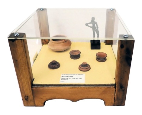 A collection of Indus Valley style objects, to include dancing girl and various terracotta pots, 29.5cm wide.