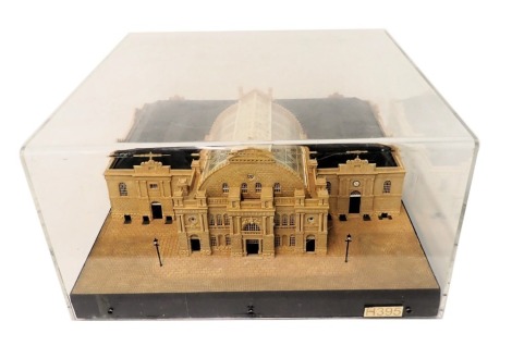 A scale model of a Georgian building with glazed roof, decorative portico, clock, circular arched windows, etc., 58cm wide.