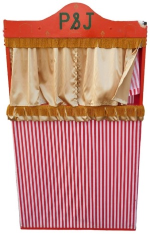 A red painted Punch & Judy booth or stage, with a striped fabric, 91cm wide.