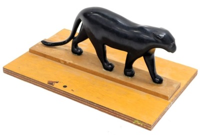 A composition bronze effect sculpture of a panther, 40cm wide, in a fitted case. - 2