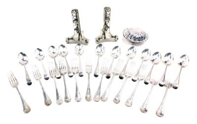 Silver plated fiddle pattern cutlery, bearing the initial J, comprising forks and tablespoons, shell capped butter dish and two Walker and Hall silver plated candle stands on tripod base. (1 tray)