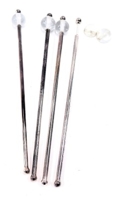 A set of four silver plated and crystal topped cocktail sticks.