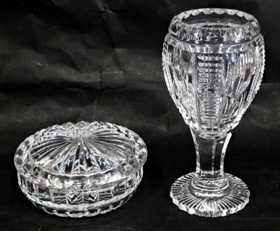 Two lead cut glass wares, comprising a goblet on petalated foot, 16cm high, and a pin dish and lid, 13cm diameter. (2)