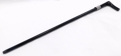 An early 20thC ebony walking cane, with silver collar, London 1927, 87cm long. - 2