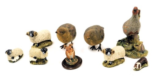 Various animal figure groups, comprising a Country Artist door mouse eating nut, 8cm high, a Border Fine Arts grouse, 20cm high, five Stef figures, comprising four sheep, and a sheep dog, and two plastic partridges, the largest figure 17cm high. (1 tray)