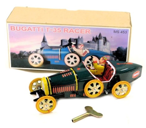 A Bugatti T35 tin plate racing car, boxed.