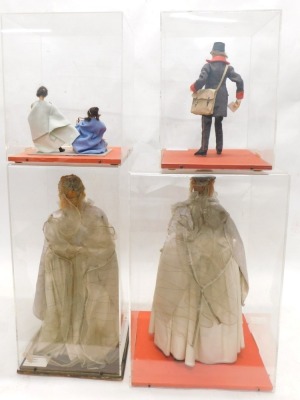 Two costume dolls, each showing Queen Elizabeth I in period dress, within Perspex cases, 64cm high, and two further costume dolls of Roman children and a 19thC postman. (4) - 2