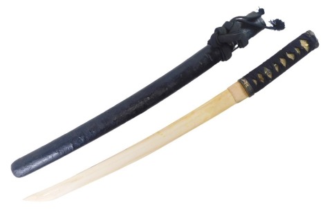 A Japanese Samurai Katana, with yellow metal embellishment to the bronze mounts, woven shagreen handle, the replacement wooden blade and lacquered scabbard, 67cm long.