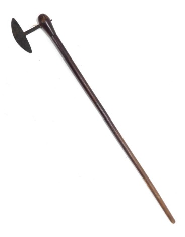 A 19thC African Zulu tribal axe, with hardwood handle, 98cm long.