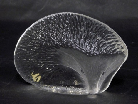 A Kosta Boda glass hedgehog paperweight, numbered 93149, signed MJ, 12cm diameter.