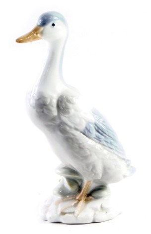 A John Jenkins ceramic figure of a duck in reeds, 20cm high.