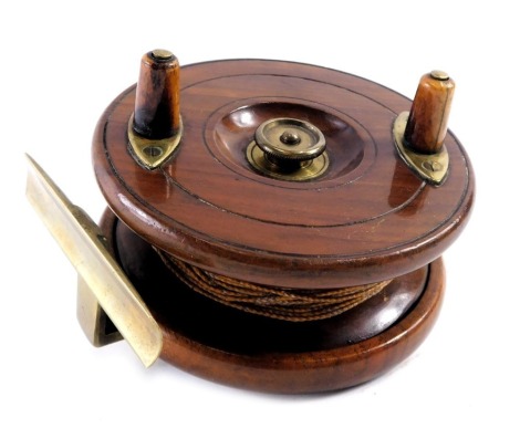 A Millwards mahogany fishing reel, with bone handles and brass fittings, 11cm wide.