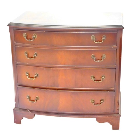 A reproduction walnut bow fronted chest, four long drawers, on bracket feet, 79cm wide.