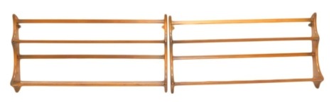 A pair of Ercol elm plate racks, each with two graduated tiers, 50cm high, 96cm wide.