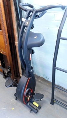 A Pro Fitness collapsible exercise bike.