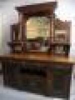 A Victorian walnut mirror back sideboard