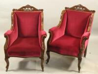 A pair of Edwardian mahogany show frame armchairs