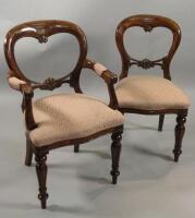 A set of ten Victorian style mahogany balloon back dining chairs