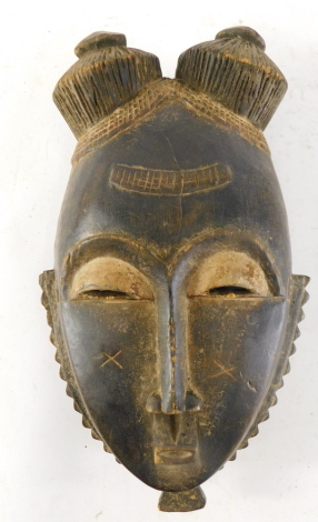 An Old Mblo portrait mask with encrusted patina, Cote D'Ivoire, 33cm high.