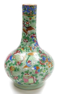 A 19thC Qing dynasty famille rose celadon porcelain vase, of long necked, globular form, decorated all over with Buddhist emblems, lion dogs and flowers, 33cm high.