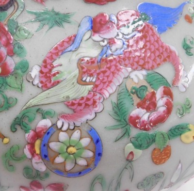 A 19thC Qing dynasty famille rose celadon porcelain vase, of long necked, globular form, decorated all over with Buddhist emblems, lion dogs and flowers, 33cm high. - 8