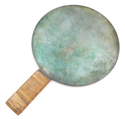 A Meiji period Kagami bronze hand mirror, the reverse embossed with a pine tree and cranes, and two characters, the handle bound in bamboo, signed, 27cm high, 18cm wide. - 4