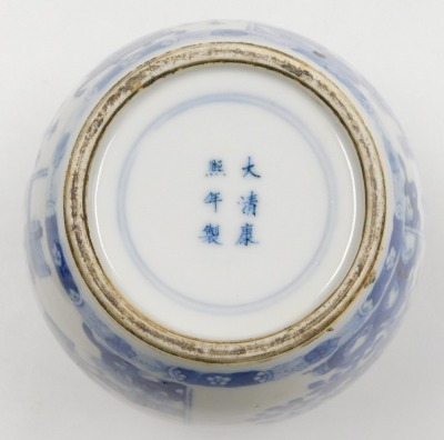 A blue and white porcelain ginger jar, and cover with six character Kangxi mark, decorated with panels of figures in interiors, vases, buddhist emblems, peonies and other flowers, 16.5cm high. - 6