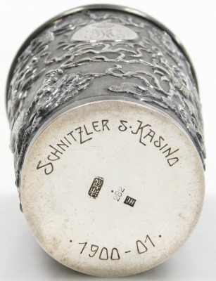 A Hung Chong silver beaker, repousse decorated with dragons chasing a flaming pearl, with a circular reserve engraved with a coronet and monogram, engraved to base Schnitzler S Kasino 1900-01, no 282, two character and HC marks, 2.87oz, 8.5cm high. - 6