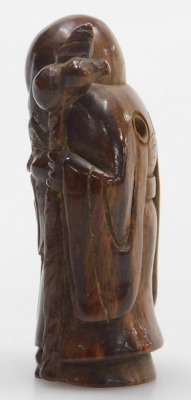 A contemporary Japanese style hardwood netsuke of Fukurokuju, modelled standing holding a peach in one hand, a staff in the other, 5cm high. - 2