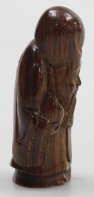 A contemporary Japanese style hardwood netsuke of Fukurokuju, modelled standing holding a peach in one hand, a staff in the other, 5cm high. - 4