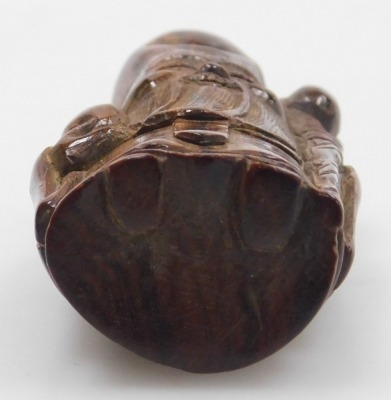 A contemporary Japanese style hardwood netsuke of Fukurokuju, modelled standing holding a peach in one hand, a staff in the other, 5cm high. - 6