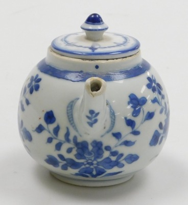 An early 20thC Japanese blue and white porcelain vase, of globular form, painted with birds and flowers, 14cm wide, together with a Chinese blue and white teapot, painted with flowers, with a European cover. 15cm wide, and a reticulated blue and white inc - 5