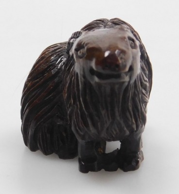 A contemporary Japanese hardwood netsuke, carved as two rams, signed, 4.5cm wide. - 2