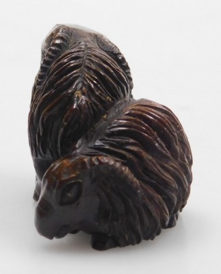 A contemporary Japanese hardwood netsuke, carved as two rams, signed, 4.5cm wide. - 4