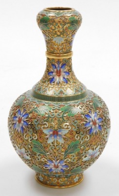 A 20thC Chinese champleve enamel vase, of bottle neck form, decorated with lotus flowers and scrolling leaves, 23cm high. - 3