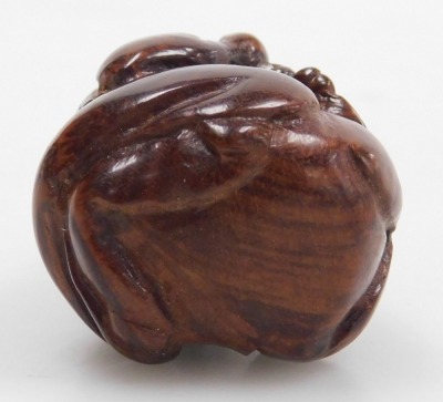 A contemporary Japanese style hardwood netsuke, carved as a boy seated upon a toad, 3.5cm high. - 6