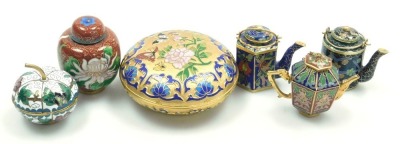 A group of Chinese cloisonne and champleve enamel wares, comprising a circular box and cover decorated with flowers and insects, and various miniatures including a ginger jar and cover, and three teapots (6)