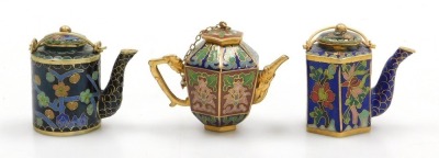 A group of Chinese cloisonne and champleve enamel wares, comprising a circular box and cover decorated with flowers and insects, and various miniatures including a ginger jar and cover, and three teapots (6) - 11