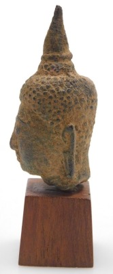 A Thai bronze head of a Buddha, possibly 17thC, raised on a wooden plinth, 9.5cm high all in. - 3