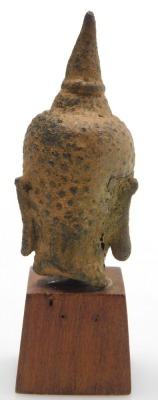 A Thai bronze head of a Buddha, possibly 17thC, raised on a wooden plinth, 9.5cm high all in. - 4