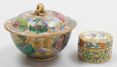 A group of Qing dynasty and later famille rose porcelain, including a gold ground ecuelle and cover, rice spoon, two teapots, and a cylindrical box and cover (a quantity). - 13