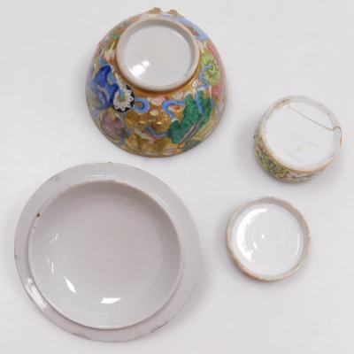 A group of Qing dynasty and later famille rose porcelain, including a gold ground ecuelle and cover, rice spoon, two teapots, and a cylindrical box and cover (a quantity). - 15