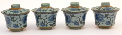 A modern Chinese pottery part tea service, decorated in blue and white with peonies against a pale blue ground, comprising a covered jug, four tea bowls, covers and saucers, and four smaller bowls, together with a metal tea strainer. - 5