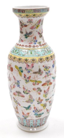 A Chinese famille rose porcelain vase, of shouldered ovoid form, all over decorated with butterflies, 32.5cm high.