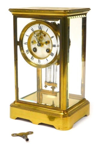 A late 19thC French brass cased regulator clock, by Hy Marc of Paris, circular brass dial with enamel chapter ring bearing Roman numerals, visible Brocot escapement, eight day movement with bell strike, with mercury pendulum, the case with glass panels, w