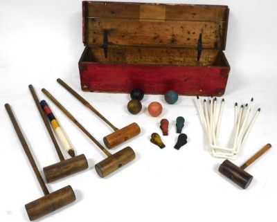 An early 20thC croquet set, with mallets, balls and hoops, pine cased, possibly Jacques, case 24cm high, 101cm wide, 31cm deep. - 4