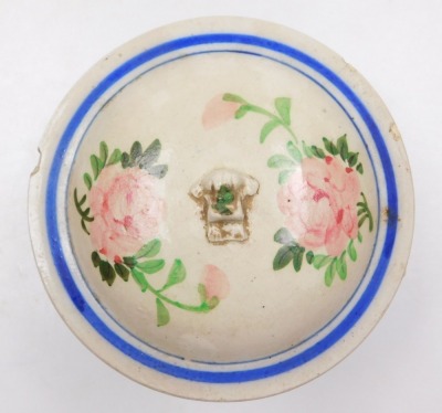 A late 19thC French pottery pot and cover, hand painted with flowers, 23cm wide. - 3