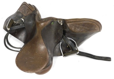 Three leather riding saddles, two with stirrups. - 3